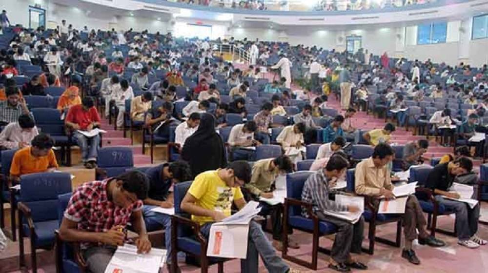 students giving mdcat in exam hall representing PMC Ordered to Blacklist the Company Which Conducted MDCAT