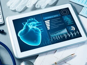 Digital heart monitoring on a tablet with medical tools and stethoscope representing MDCAT Crash Course