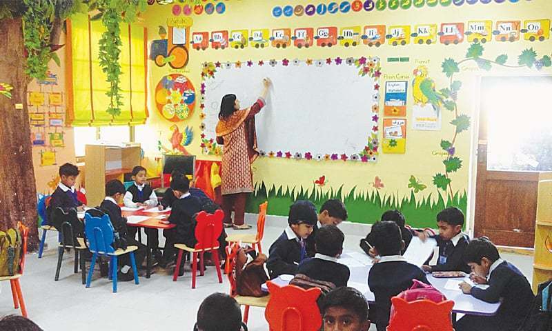 image of private school teacher teaching in a class