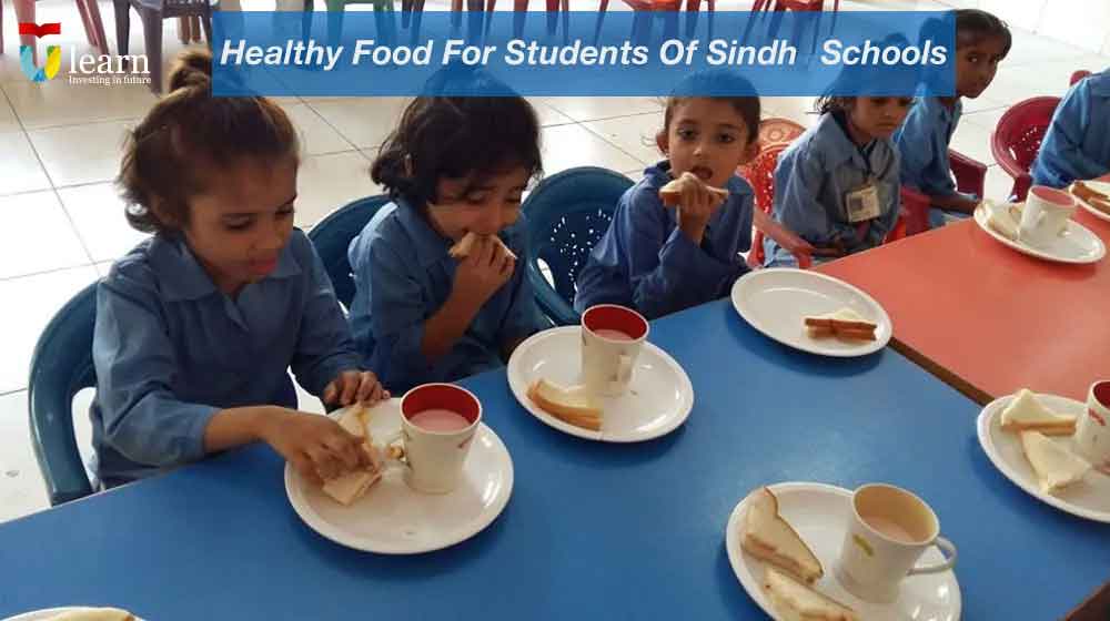 image of students of a government school having lunch