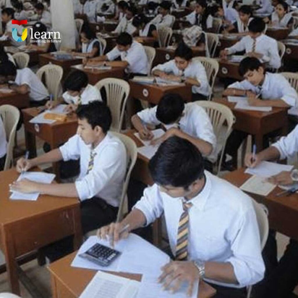 students giving exams in examination hall punjab govt announce matric and inter exams date